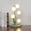 Table lamp featuring a bell orchid
