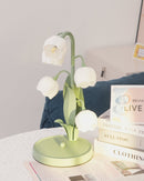 Table lamp featuring a bell orchid