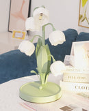 Table lamp featuring a bell orchid